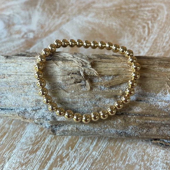 handmade Jewelry - 5 mm Handmade 14k gold filled bead stretch bracelet
14k gold filled 5 mm beads